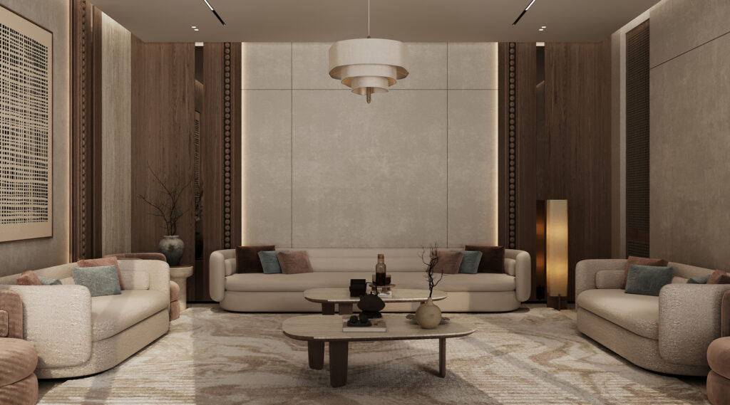 لقطة قريبة لتأثيث صالة استقبال مودرن من تصميم تيلا للتصميم الداخلي، تظهر فيها الألوان الترابية المتوازنة واللوحات التشكيلية الهادئة.
