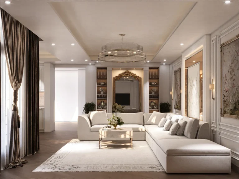 تصميم صالة معيشة مفتوحة على الطراز الفرنسي المعاصر من تنفيذ TELA Architects، تضم كنب زاوية فاخر (L-shape)، ثريا مودرن دائرية، جدران بالبانوهات الكلاسيكية البيضاء، وأرضيات خشبية هيرينغبون في فيلا سكنية بجدة.