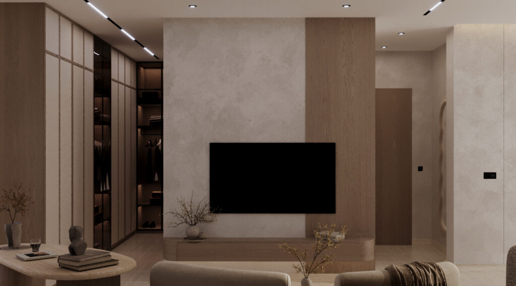 جدار تلفزيون وغرفة ملابس مدمجة (Dressing Room) بإضاءة داخلية دافئة لخزائن الملابس، تنفيذ شركة تيلا الهندسية.